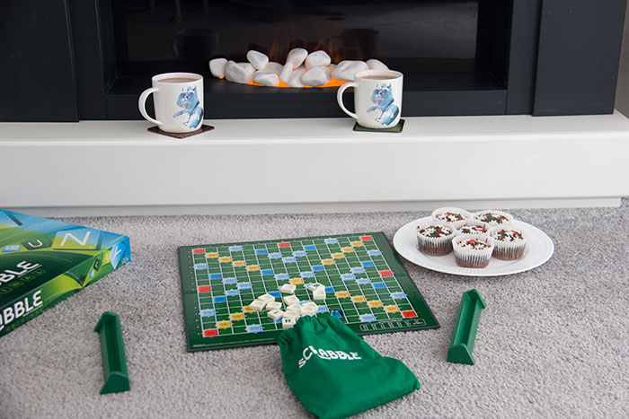 Cupcakes, games, and hot chocolate. Near the fireplace