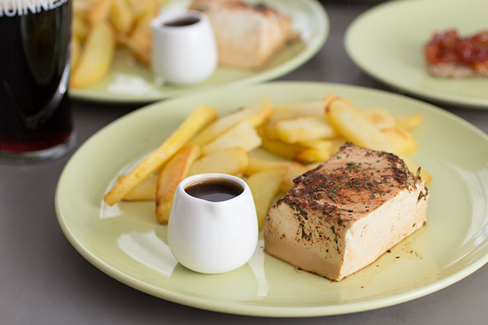 Tofu in Guinness with sauce and chips