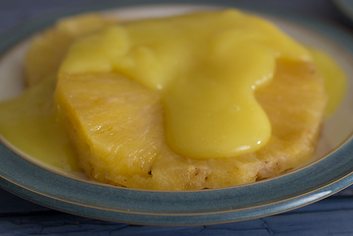 Baked Pineapple with Custard. Close up