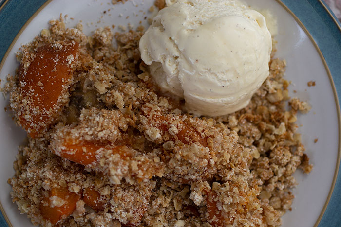 Banana and apricot crumble. Close up