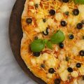 Vegan pizza with olives and capers